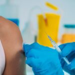 Medical Worker Holding Syringe with Vaccine. Corona Virus Vaccination.