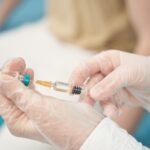 Nurse with medicine for injection in hospital